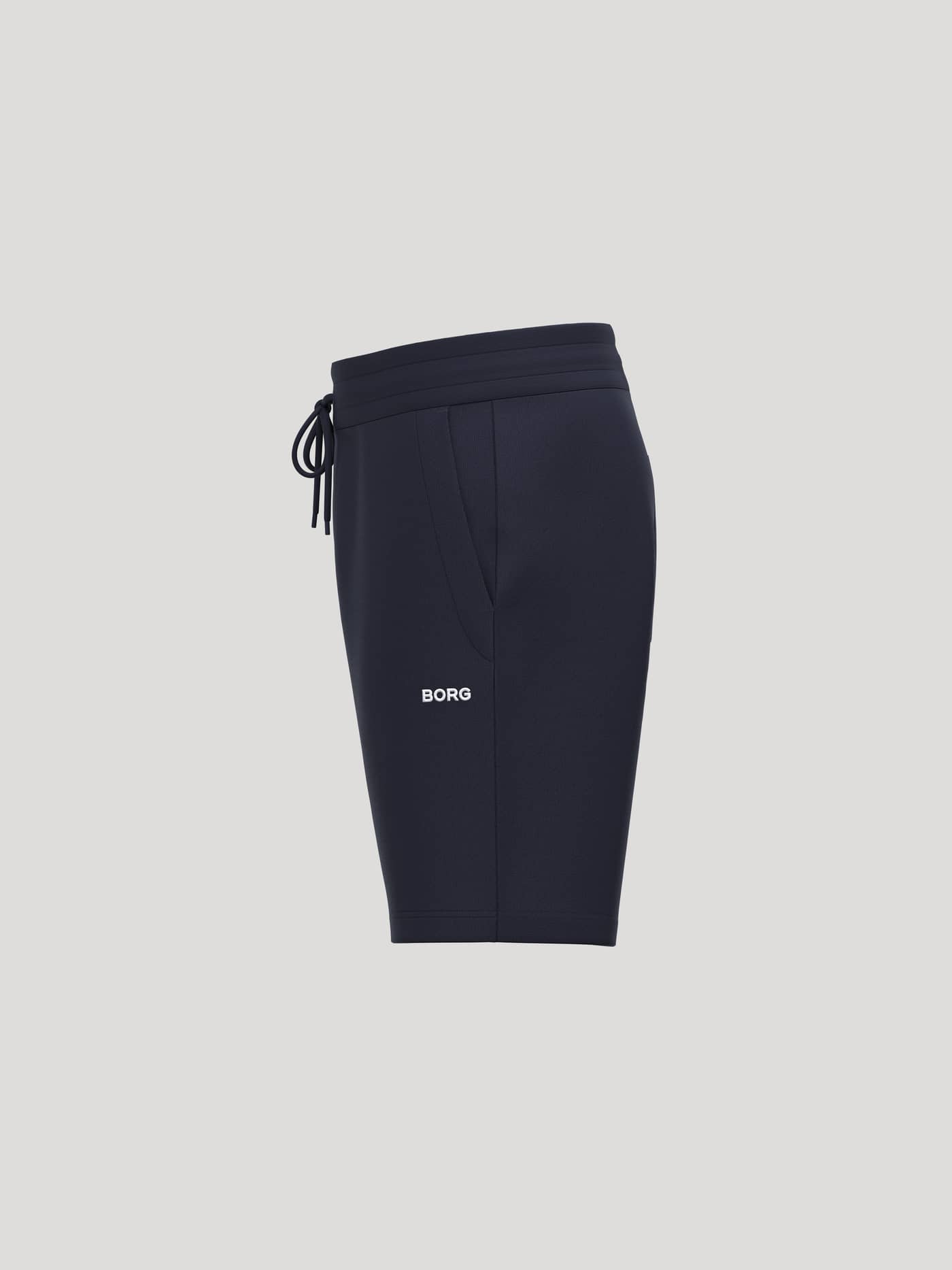 Borg Essential 4 Sweatshorts i Night Sky (Marineblå) set fra siden i blød french terry med et hvidt logo. - Image 3