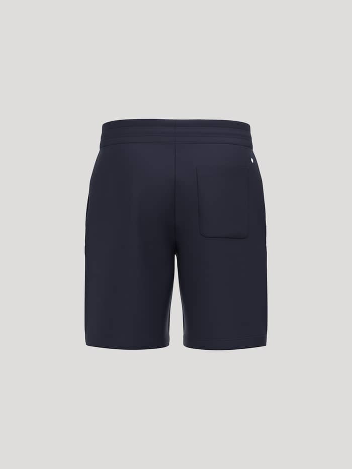 Achteraanzicht van de Borg Essential 4 Sweatshorts in Night sky (Marineblauw) met achterzak en geborduurde tennisbal. - Image 2