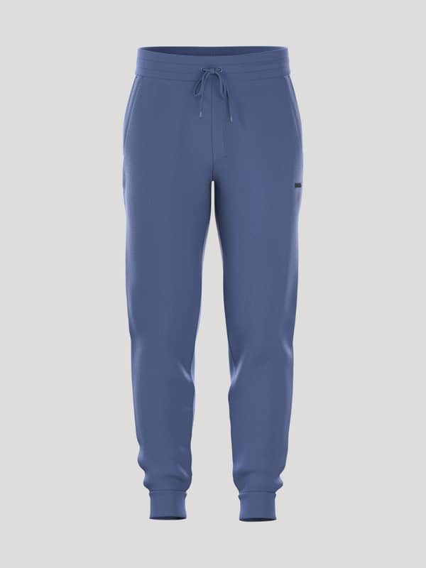 Front view of the Borg Essential 4 Tapered Sweatpants in Coastal Fjord (Blue), featuring black logo embroidery.