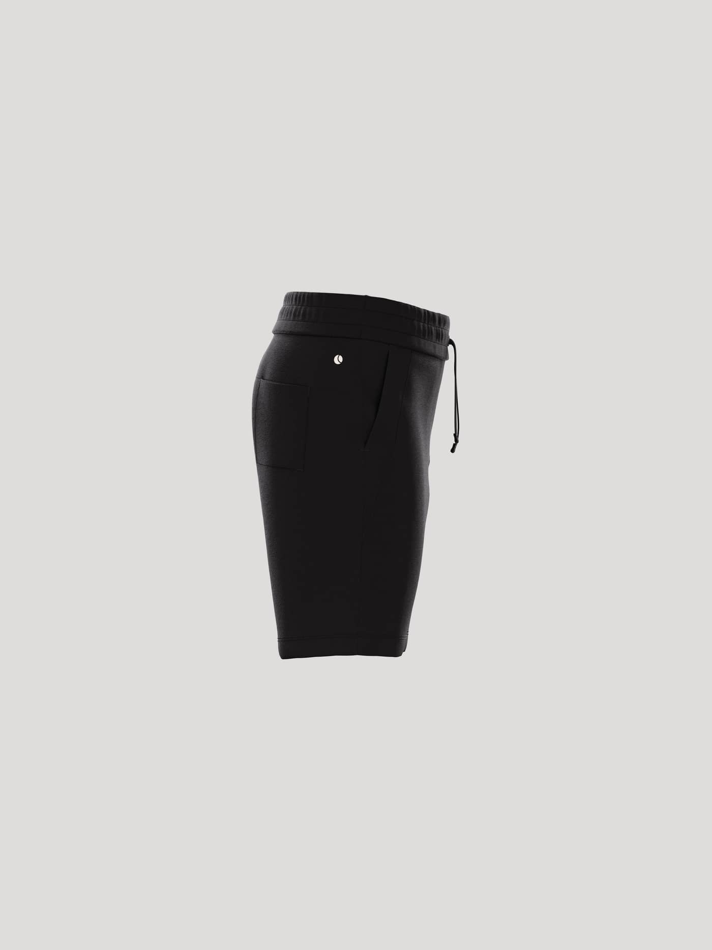 Zijaanzicht van de Borg Essential 1 Sweatshorts voor kids in Black Beauty (Zwart), van een zachte katoenmix met wit logo. - Image 2