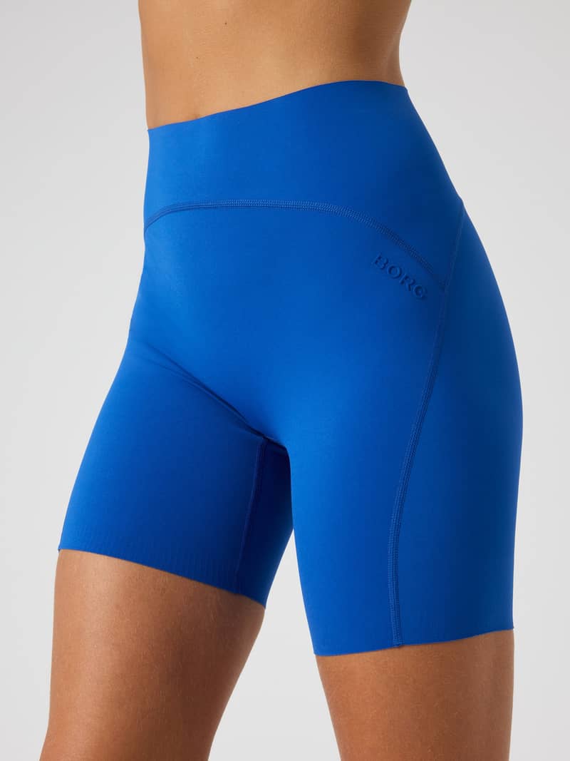 Borg Sleek Shorts i Monaco Blue (Blå) för damer med hög midja och ton-i-ton-logotyp för optimal träningsprestanda.