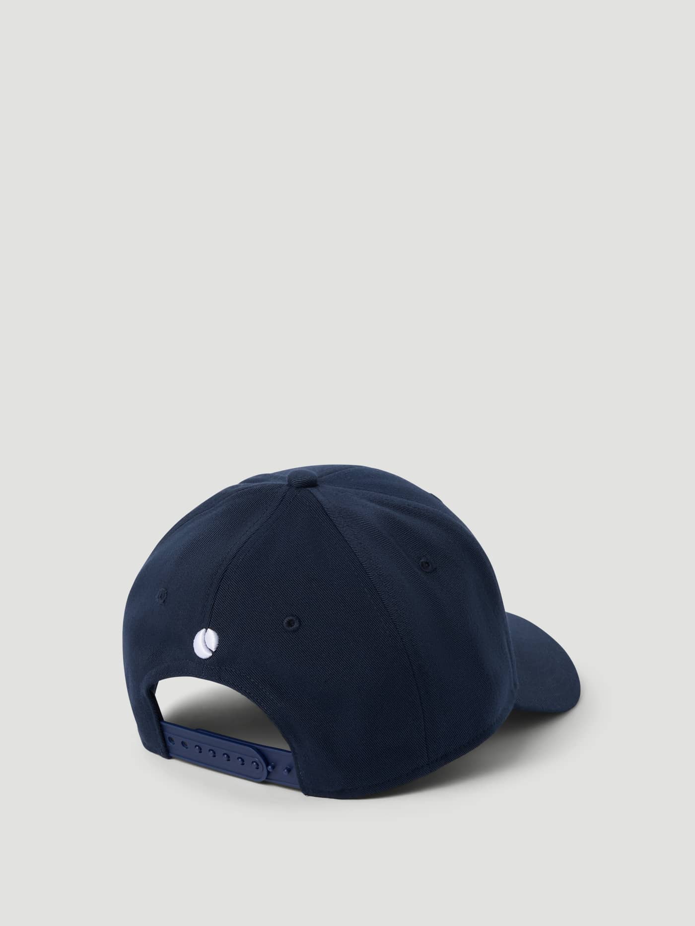 Back view of the recycled polyester Borg Baseball Cap in Night sky (Navy) with a tennis ball logo detail. - Image 2