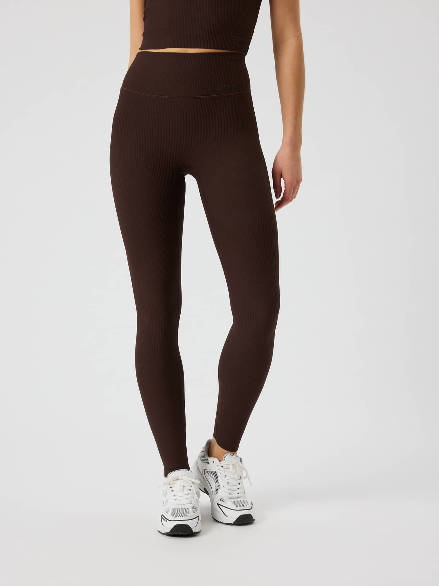 Front view of Studio Ribbed Tights in Coffee Bean (Brown) with a high waist and textured ribbed design for training. - Image 2