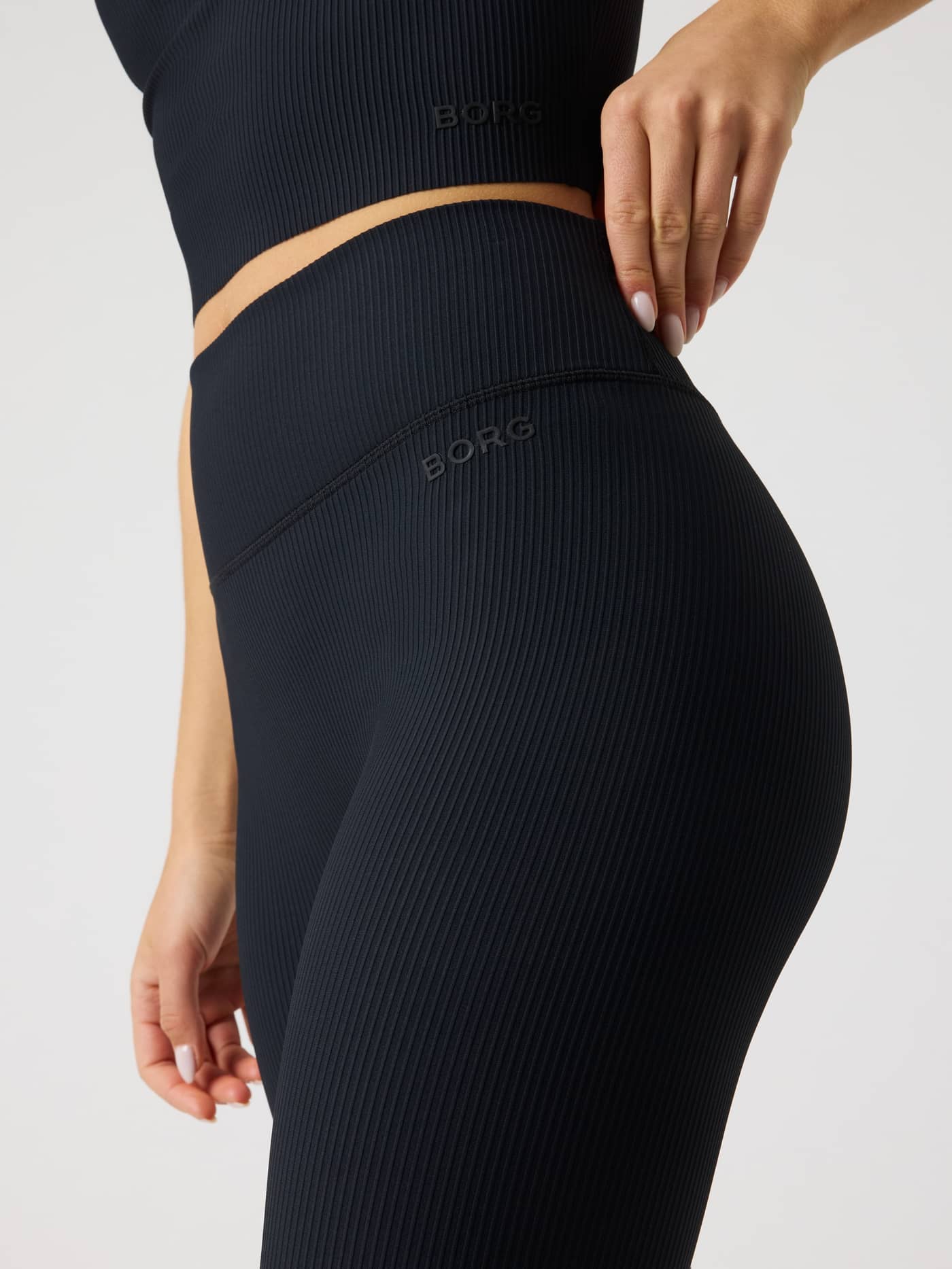 Women's Studio Ribbed Tights in Black Beauty (Black) for training, featuring a high waist and tonal black BORG logo. - Image 5