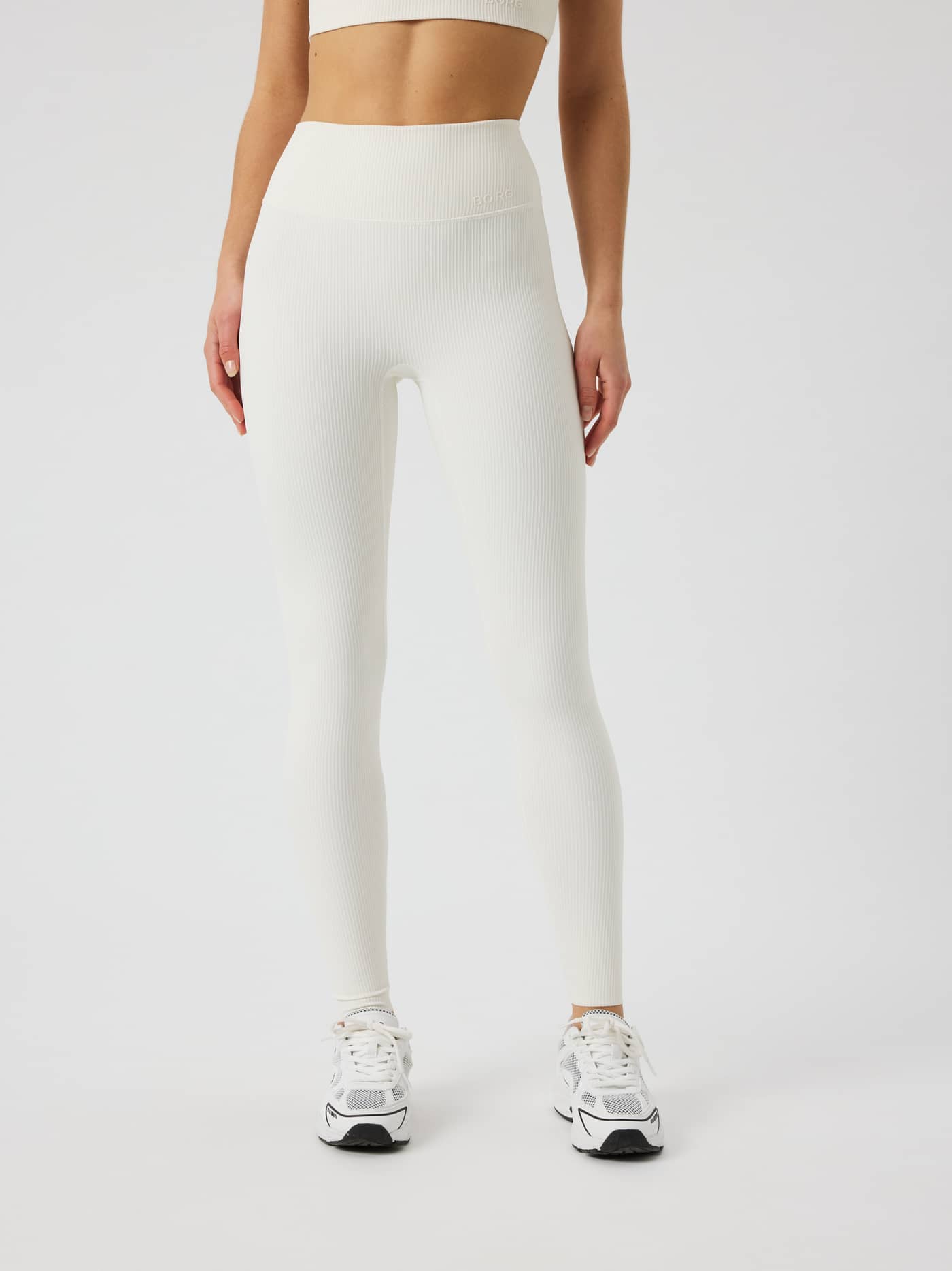 Front view of the Studio Ribbed Tights in Tofu (White) with a high waist and textured rib design for training. - Image 2