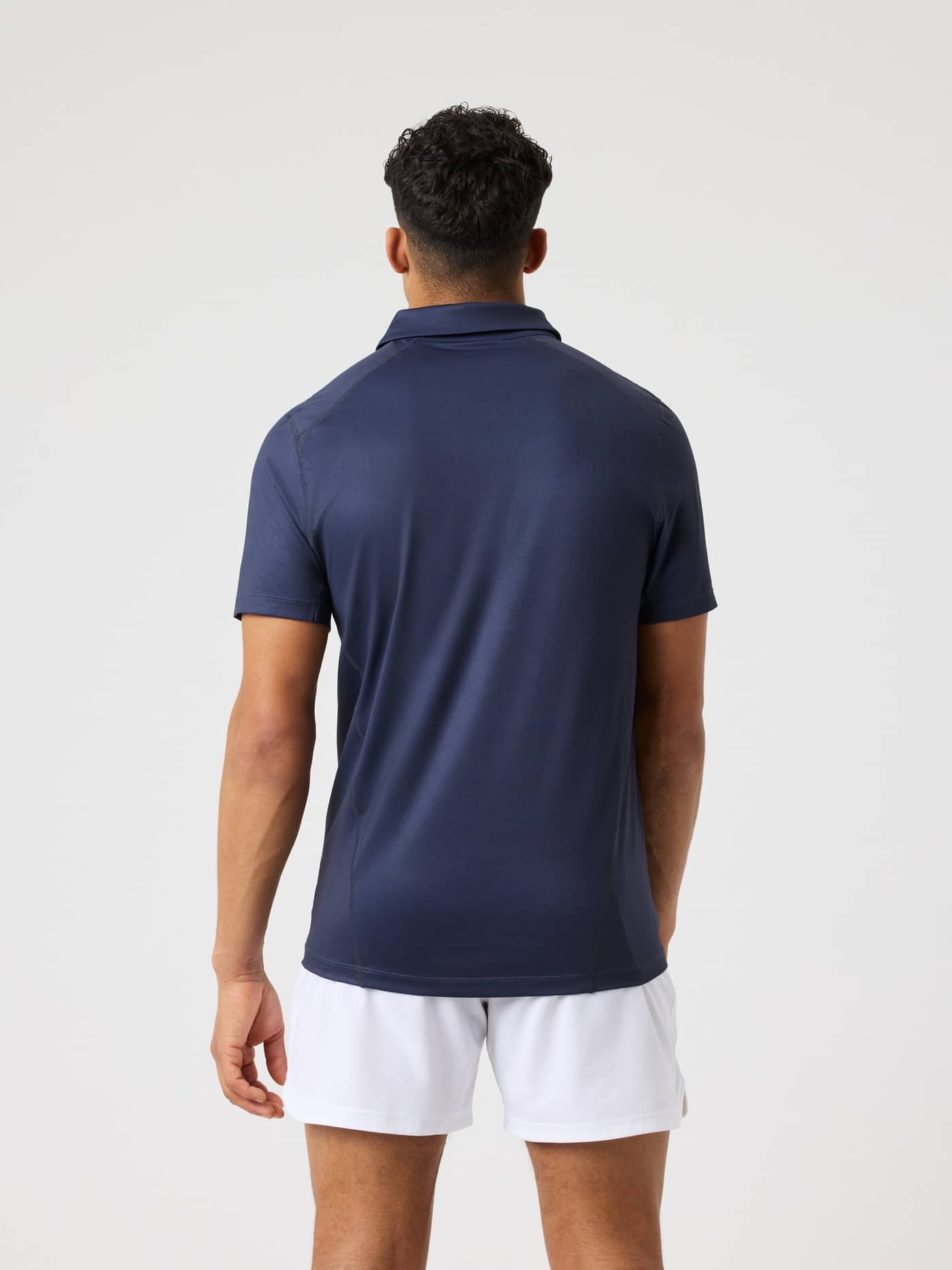 Borg Sports Polo Shirt i Night sky (Blå) set bagfra med fokus på stil og performance til tennis. - Image 2