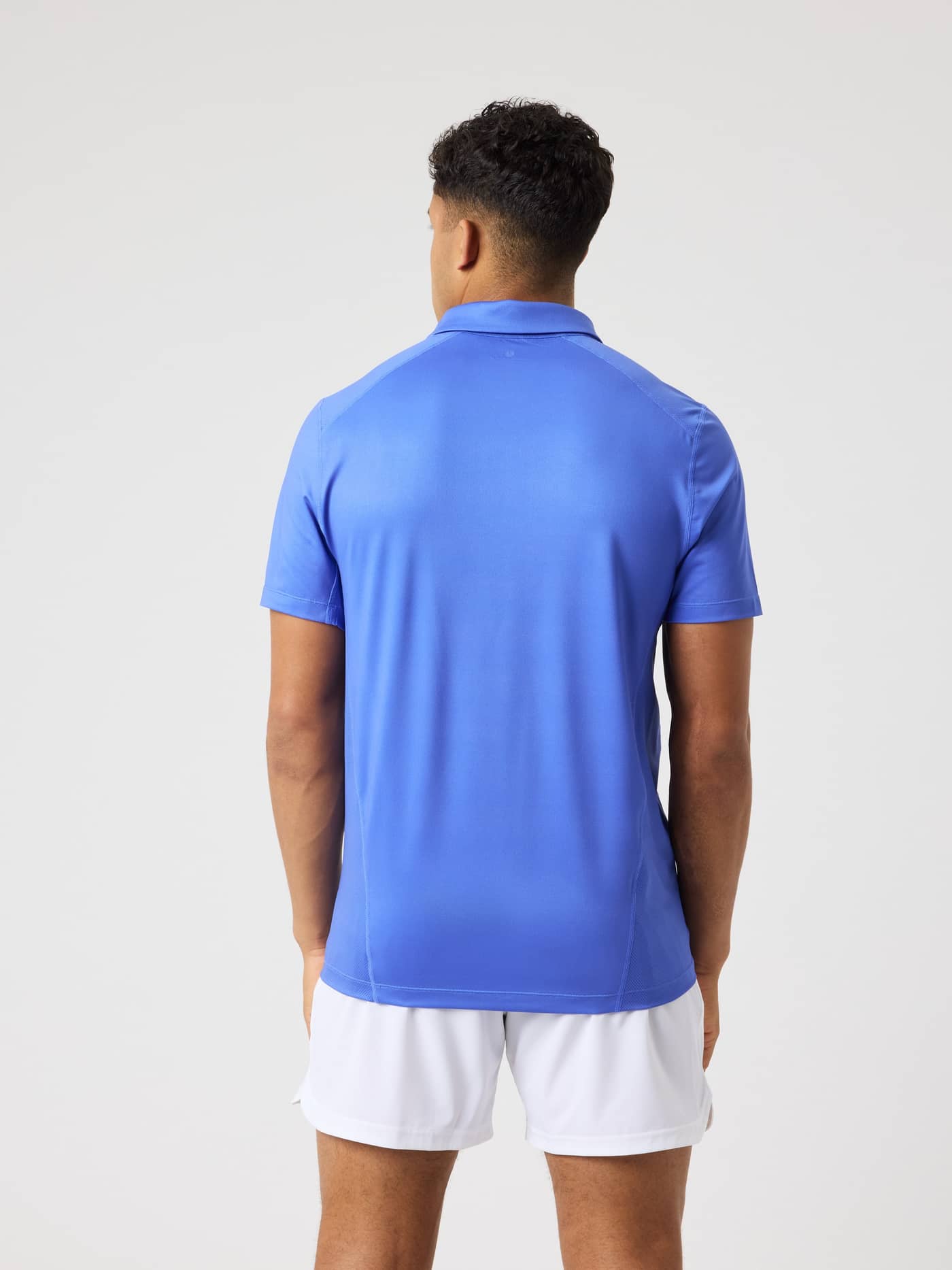 Borg Sports Polo Shirt i Amparo Blue (Blå) set bagfra, designet til optimal funktion og stil til tennis og træning. - Image 2