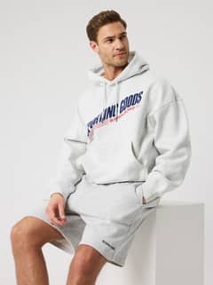 Borg Oversized Hoodie in Ultra Light Grey Melange (Grey) for men with a chest graphic and functional kangaroo pocket. - Image 1
