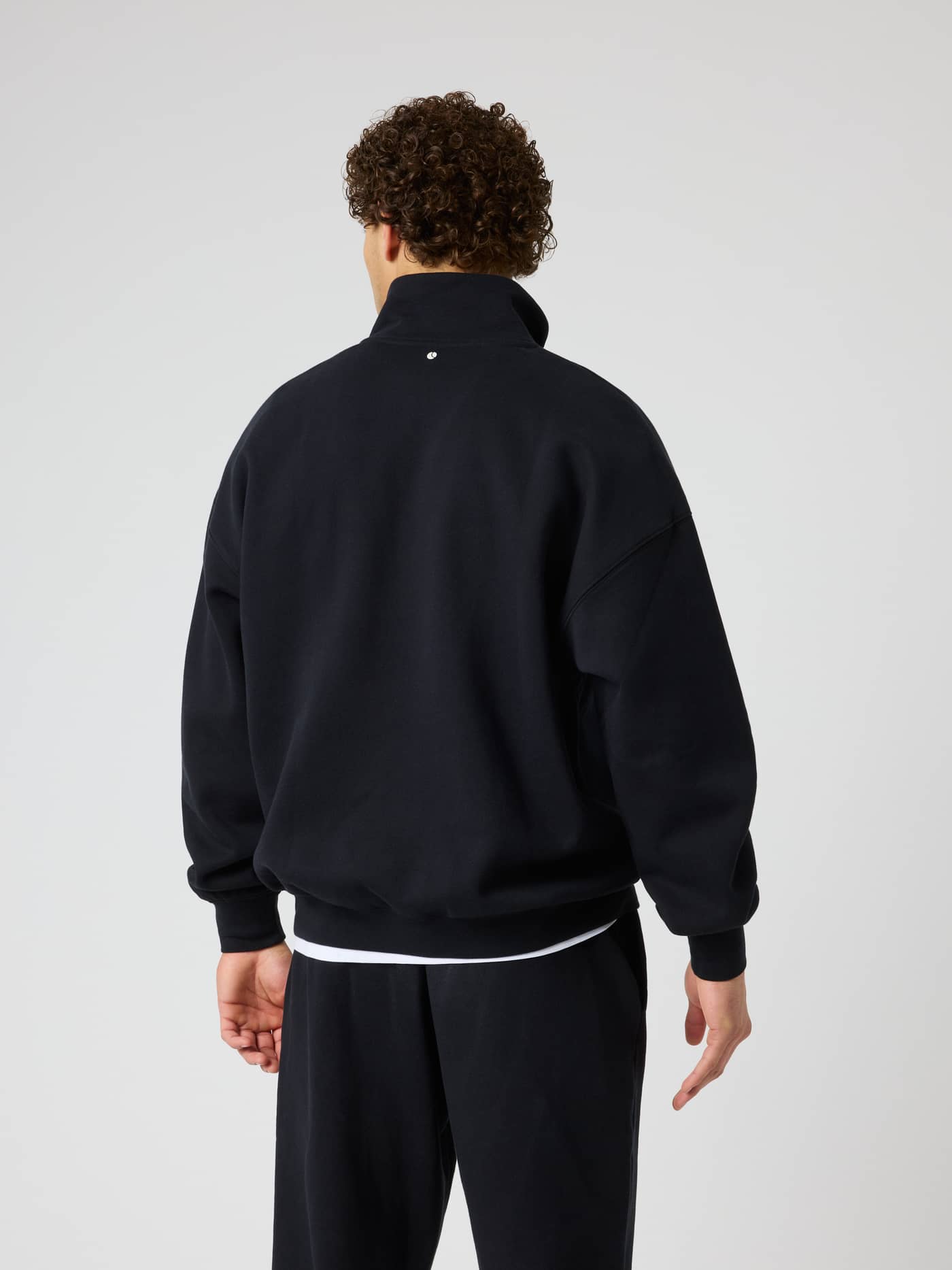 Back view of the Borg Oversized Half-Zip in Black Beauty (Black) for training, featuring a tennis ball print. - Image 3