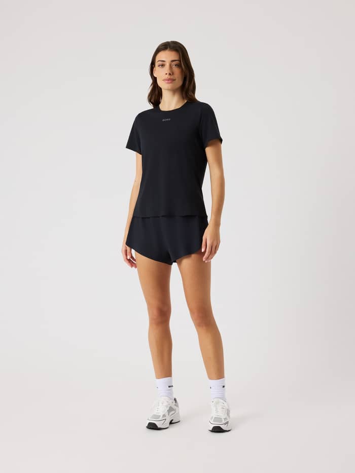 Front view of a woman wearing Black Beauty (Black) Borg Performance 2 In 1 Shorts, perfect for running and training. - Image 3