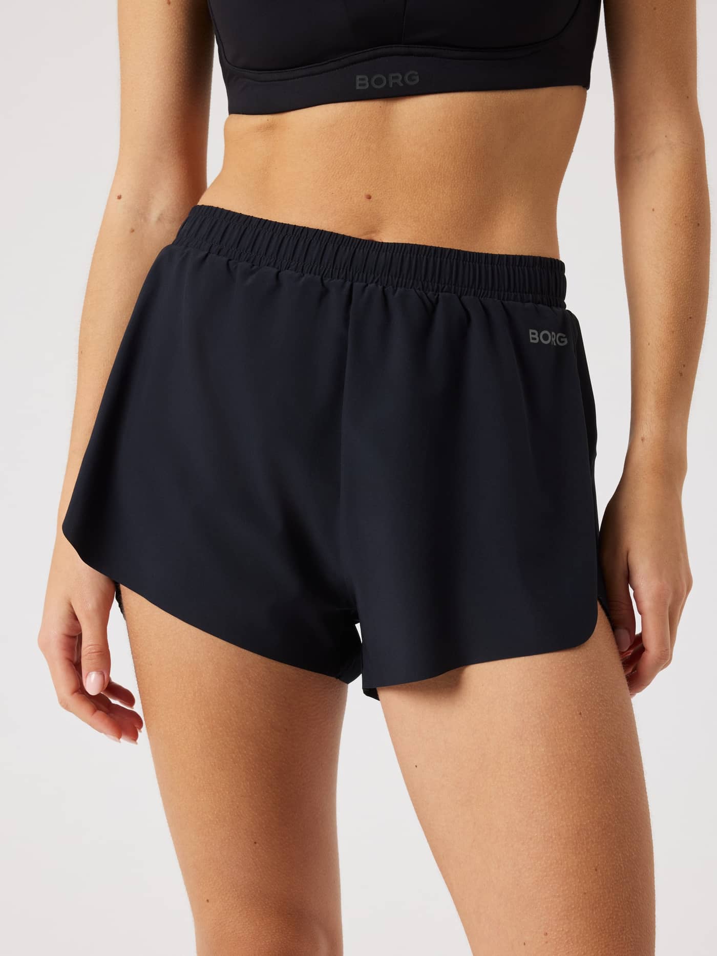 Front view of the Borg Performance 2 In 1 Shorts in Black Beauty (Black), offering a stylish fit for running and training. - Image 1