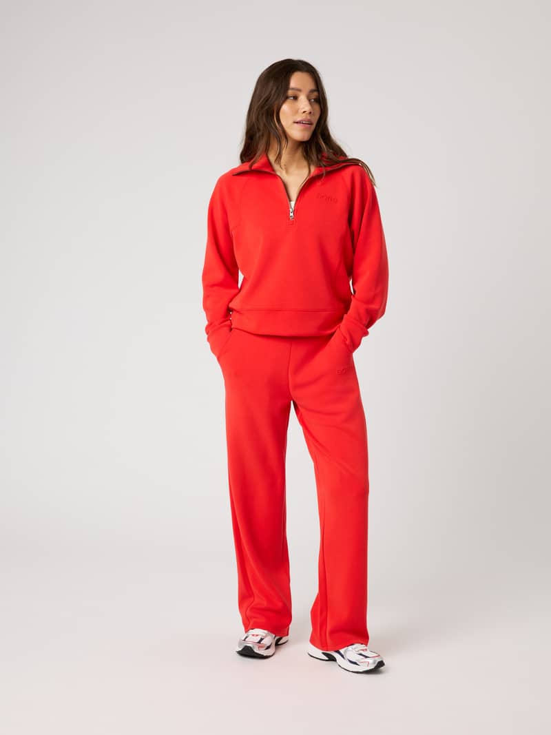 Full-body front view of the Studio Soft Halfzip Sweatshirt in Flame Scarlet (Red) with a tonal logo and loose fit. - Image 4