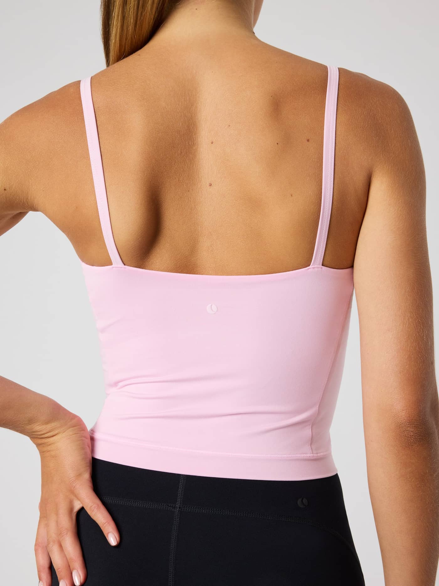Back view of the Björn Borg Studio Soft Cropped Tank Top in Pink Lady (Pink), a slim-fit training and tennis top. - Image 6