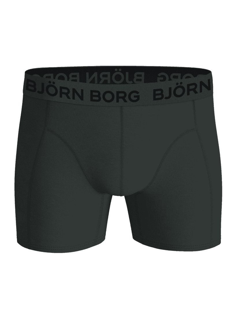 Front view of green kids' boxer briefs with a black logo from the Björn Borg Cotton Stretch Boxers 5-pack. - Image 2