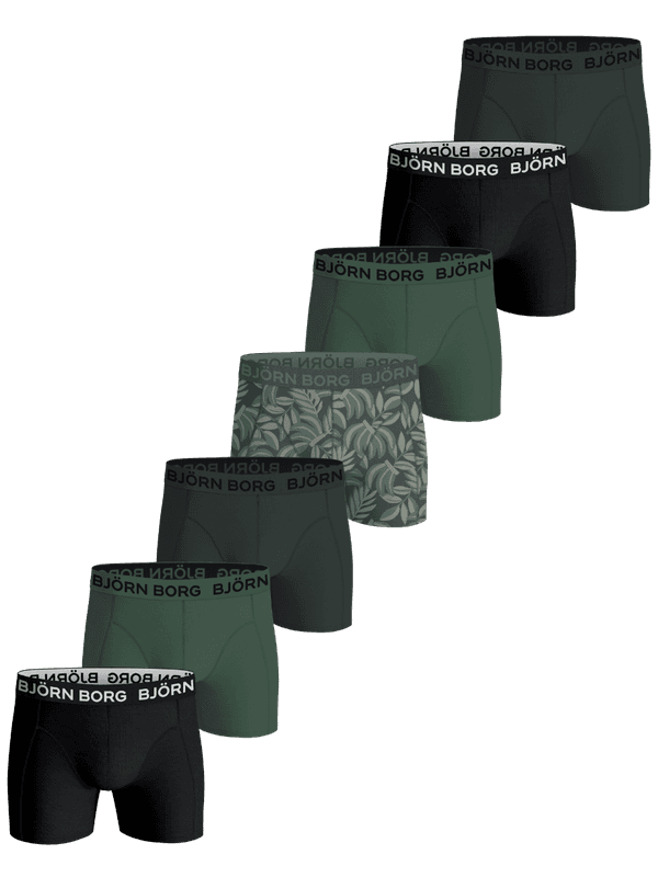 Front view of the Cotton Stretch Boxers 7-pack for kids in green, black, and leaf print boxer briefs with white logos.
