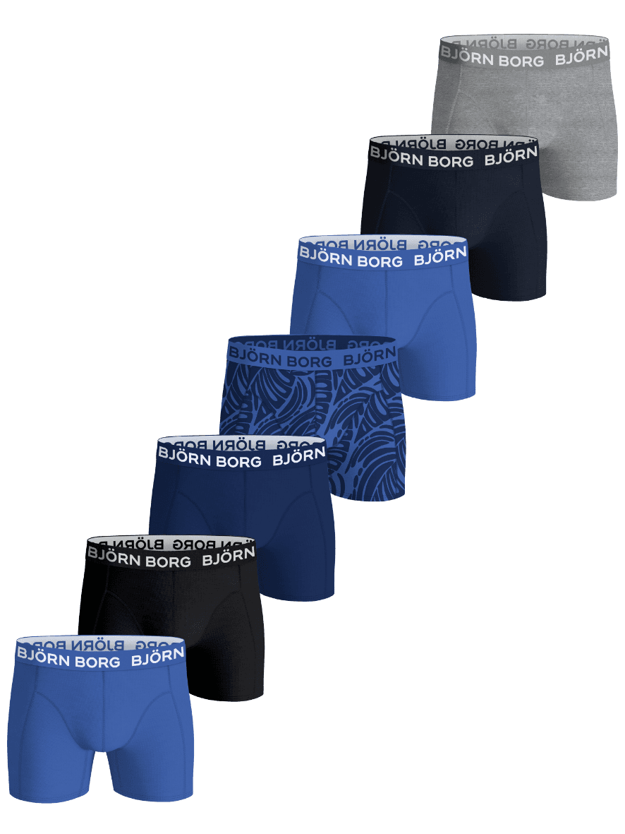 Cotton Stretch Boxers 7-pack for kids in soft cotton featuring melange, navy blue, blue, black, and print with white logos. - Image 1