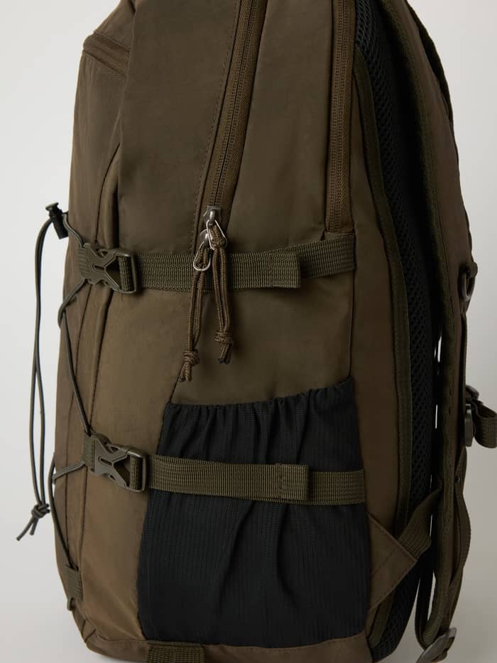 Side detail of the Borg Explorer Backpack 28L in Falcon (Brown) featuring durable polyamide and buckles for training. - Image 4