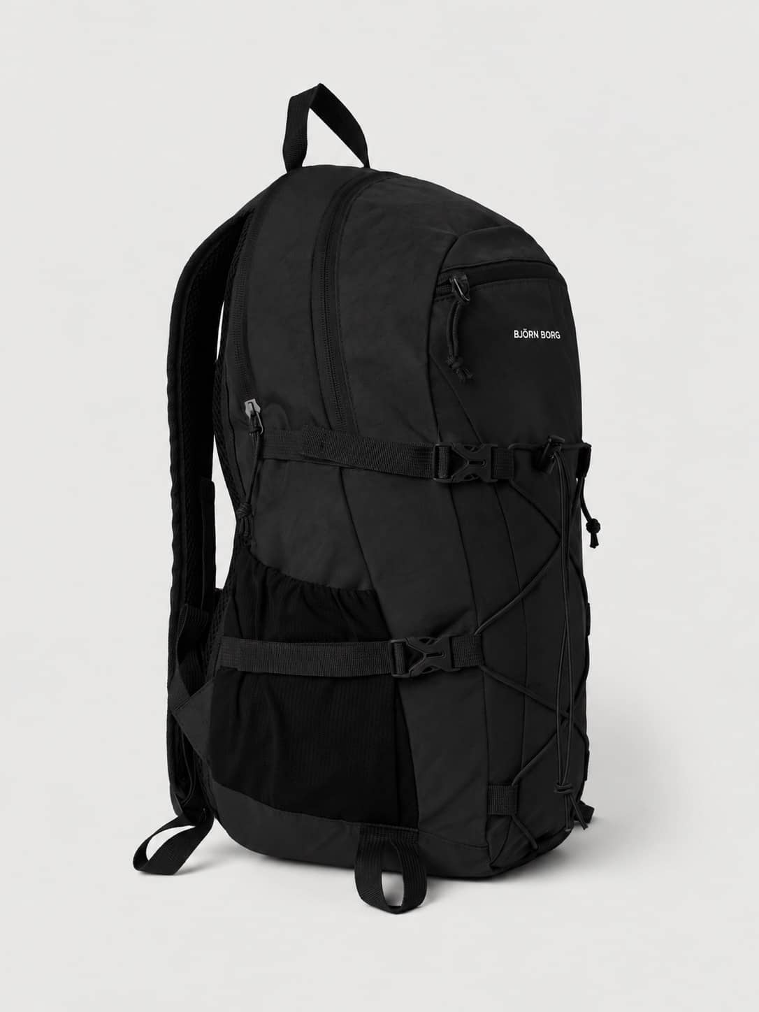 Side view of the Borg Explorer Backpack 28L in Black Beauty (Black) featuring adjustable straps and a white logo. - Image 3