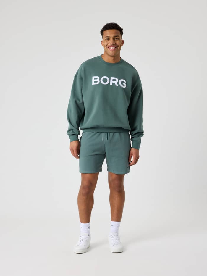 Björn Borg Oversized Logo Sweatshirt in Balsam Green (Groen) met wit logo, stijlvol en functioneel vooraanzicht van een man. - Image 4