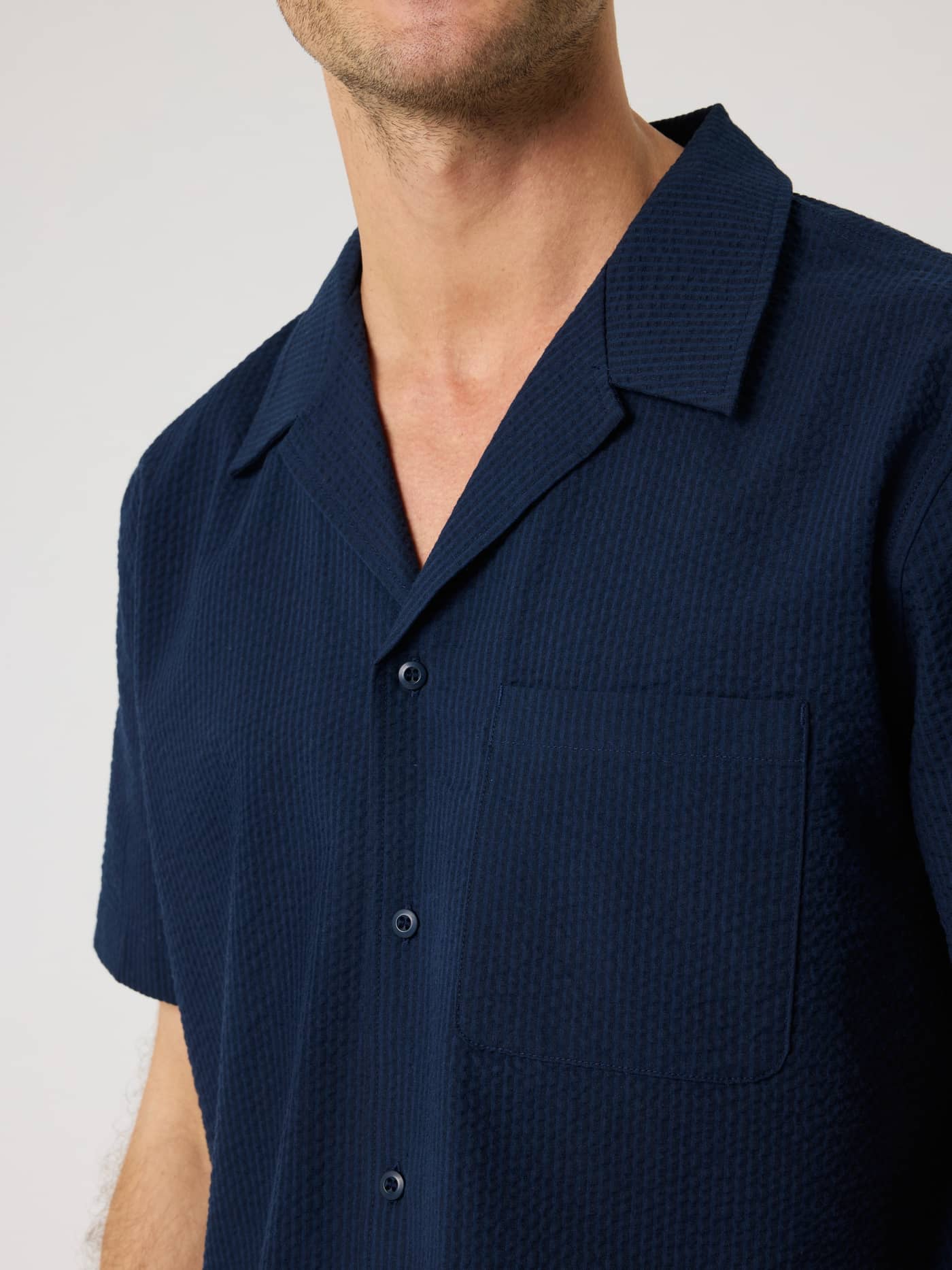 Borg Seersucker Resort Shirt in Night sky (Navy) featuring a regular fit, textured fabric, camp collar, and chest pocket. - Image 4