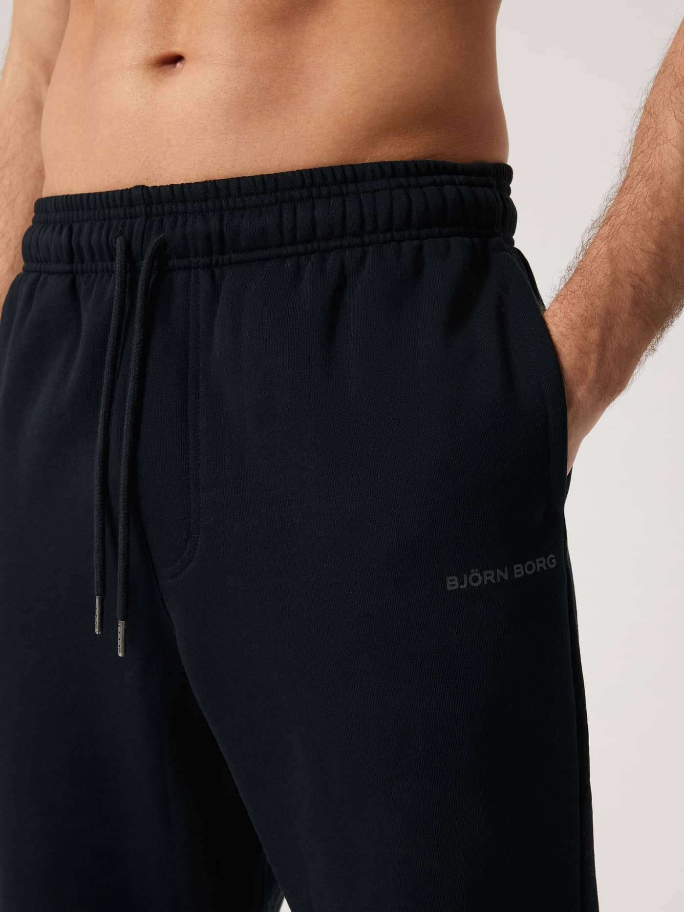 Borg Oversized Sweatpants in Black Beauty (Black) for men, featuring a tennis-inspired oversized fit and black logo. - Image 3