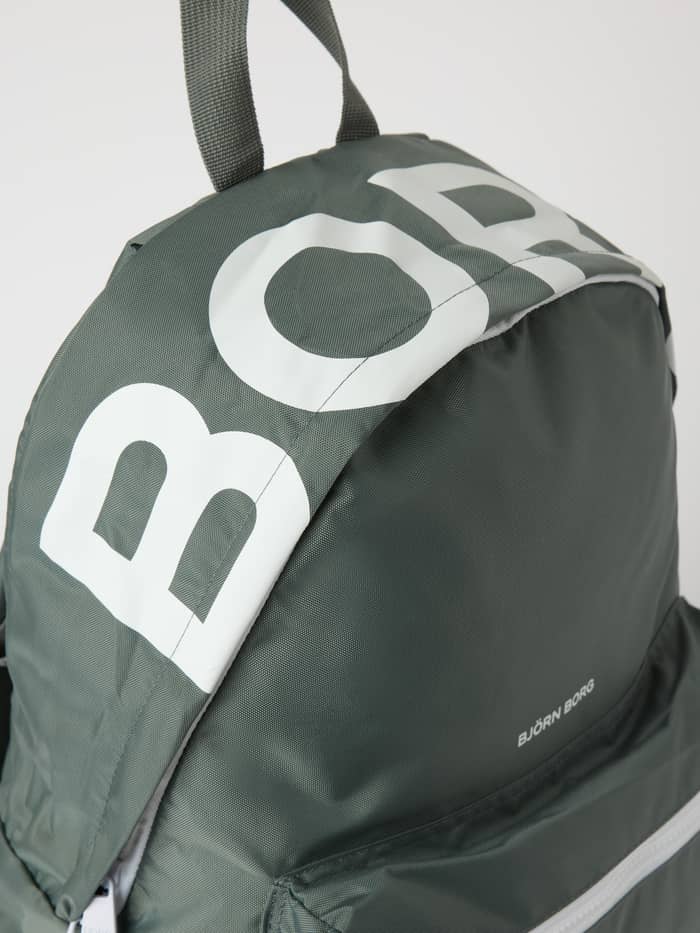Close-up view of the Borg Logo Backpack 27L in Balsam Green (Green) featuring a large white logo print on top. - Image 3