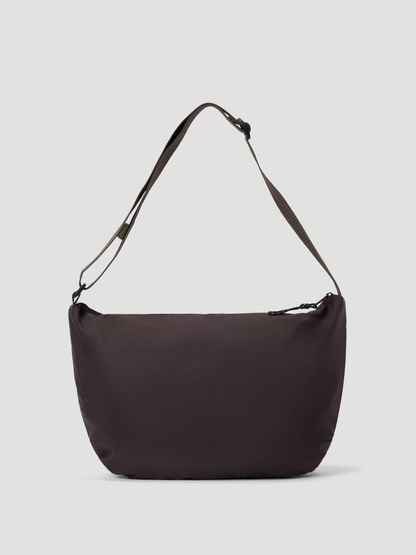 Studio Active Shoulder Bag 20L in Coffee Bean (Brown) featuring a sleek design and adjustable strap for training. - Image 1