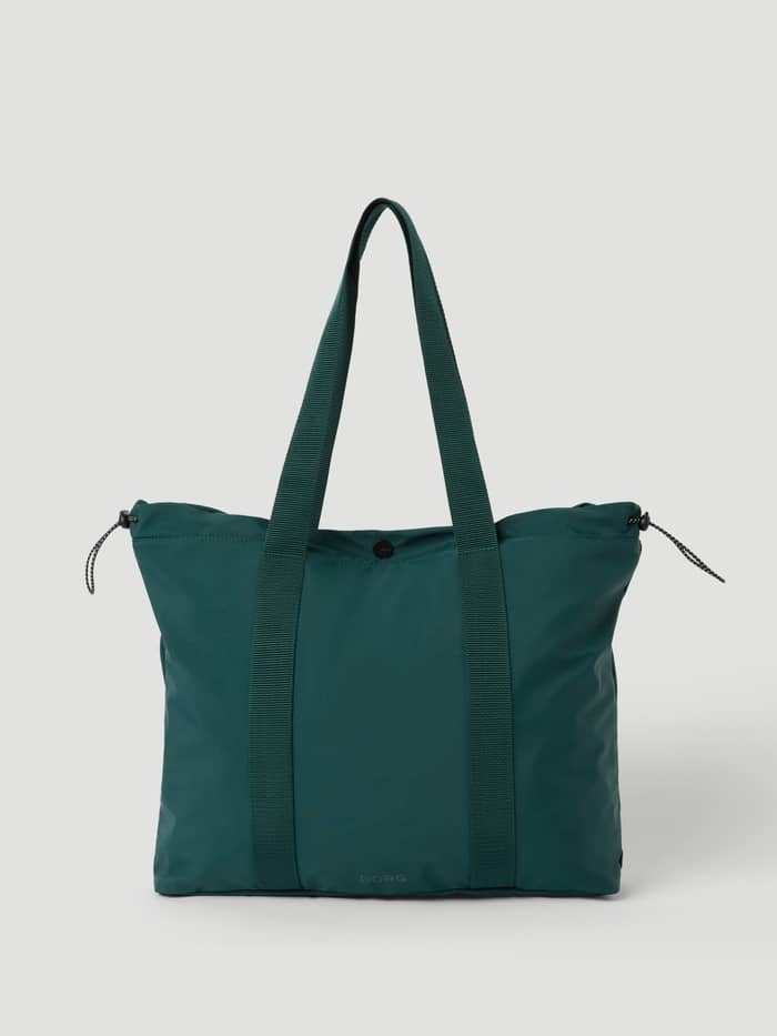 Studio Active Tote 23L in Mallard Green (Green) with adjustable side drawstrings and a tonal Borg logo for studio sessions.