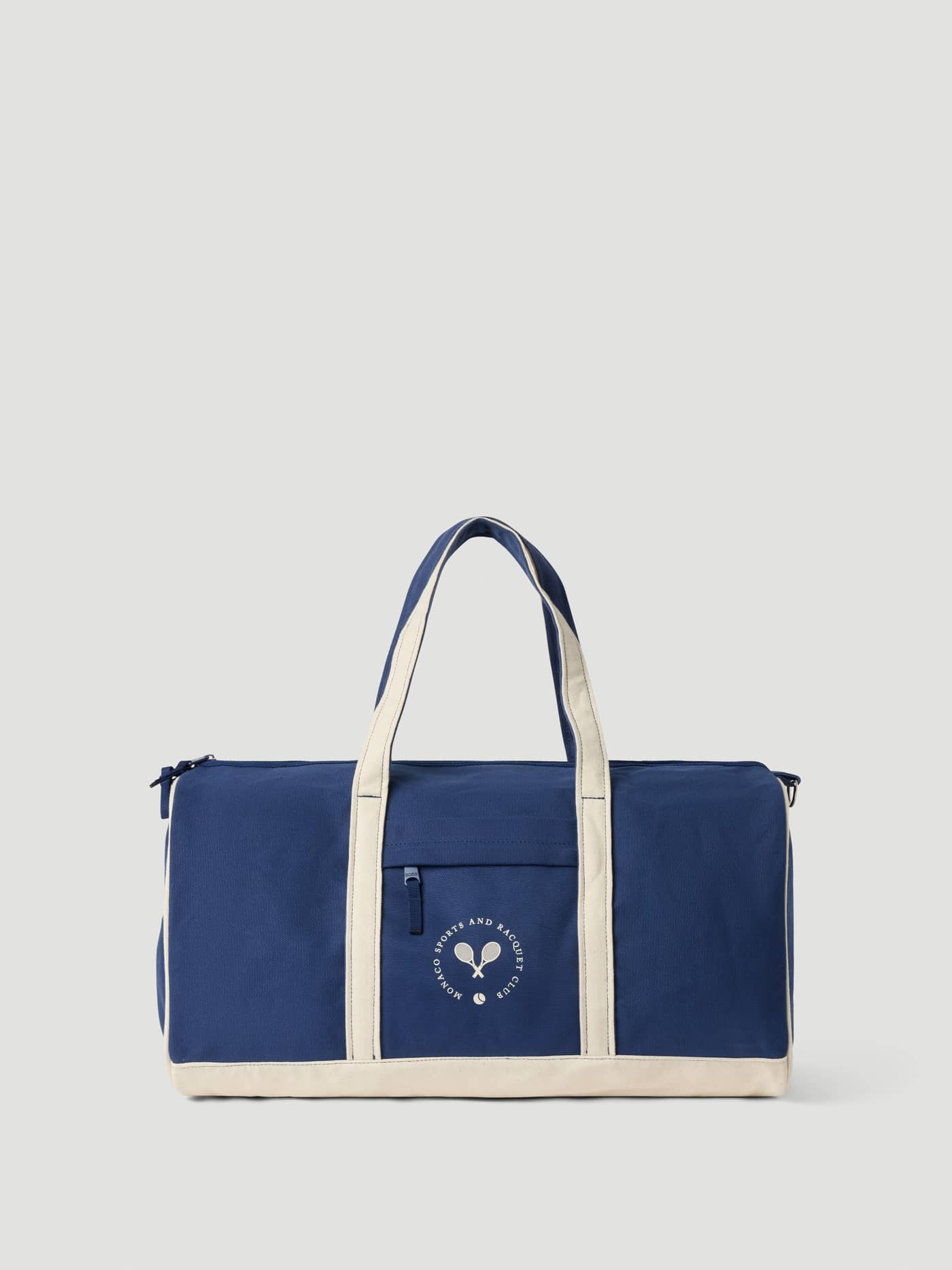 Ace Canvas Sports Bag 40L in Blue Depths (Blue) made of 100% cotton canvas with cream straps and a white tennis logo. - Image 1