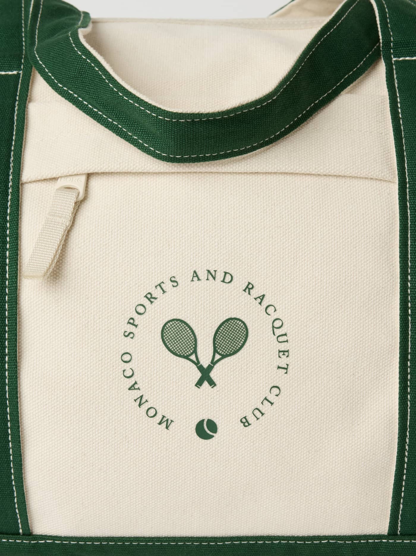 Ace Canvas Sports Bag 40L in Egret (Weiß) aus robustem Baumwoll-Canvas mit grünem Tennis-Logo für Style und Performance. - Image 4