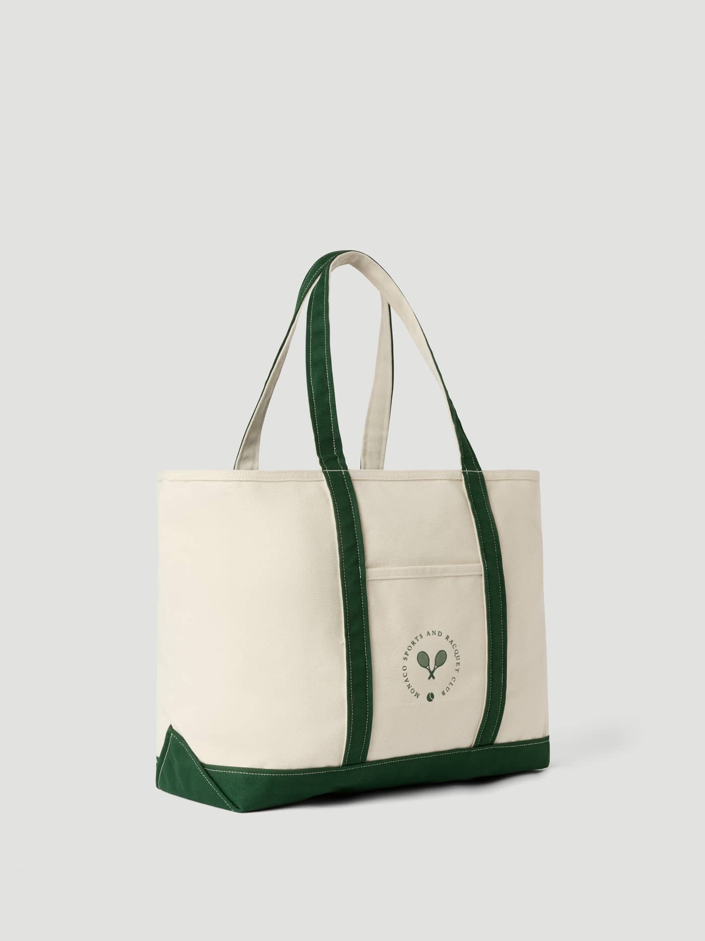Ace Canvas Tote 30L i Egret (Hvit), en slitesterk tennisbag i bomullscanvas med grønne stropper og racket-logo. - Image 3