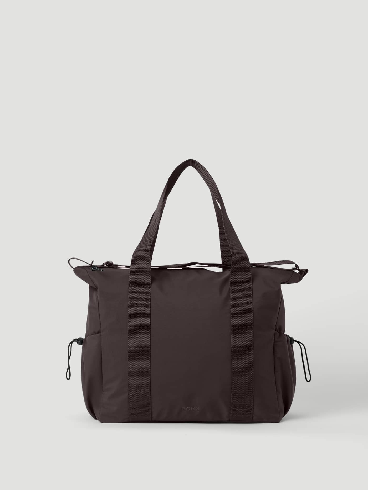 Studio Active Sports Bag 25L in Coffee Bean (Brown), a durable polyester training bag with drawstring side pockets. - Image 1