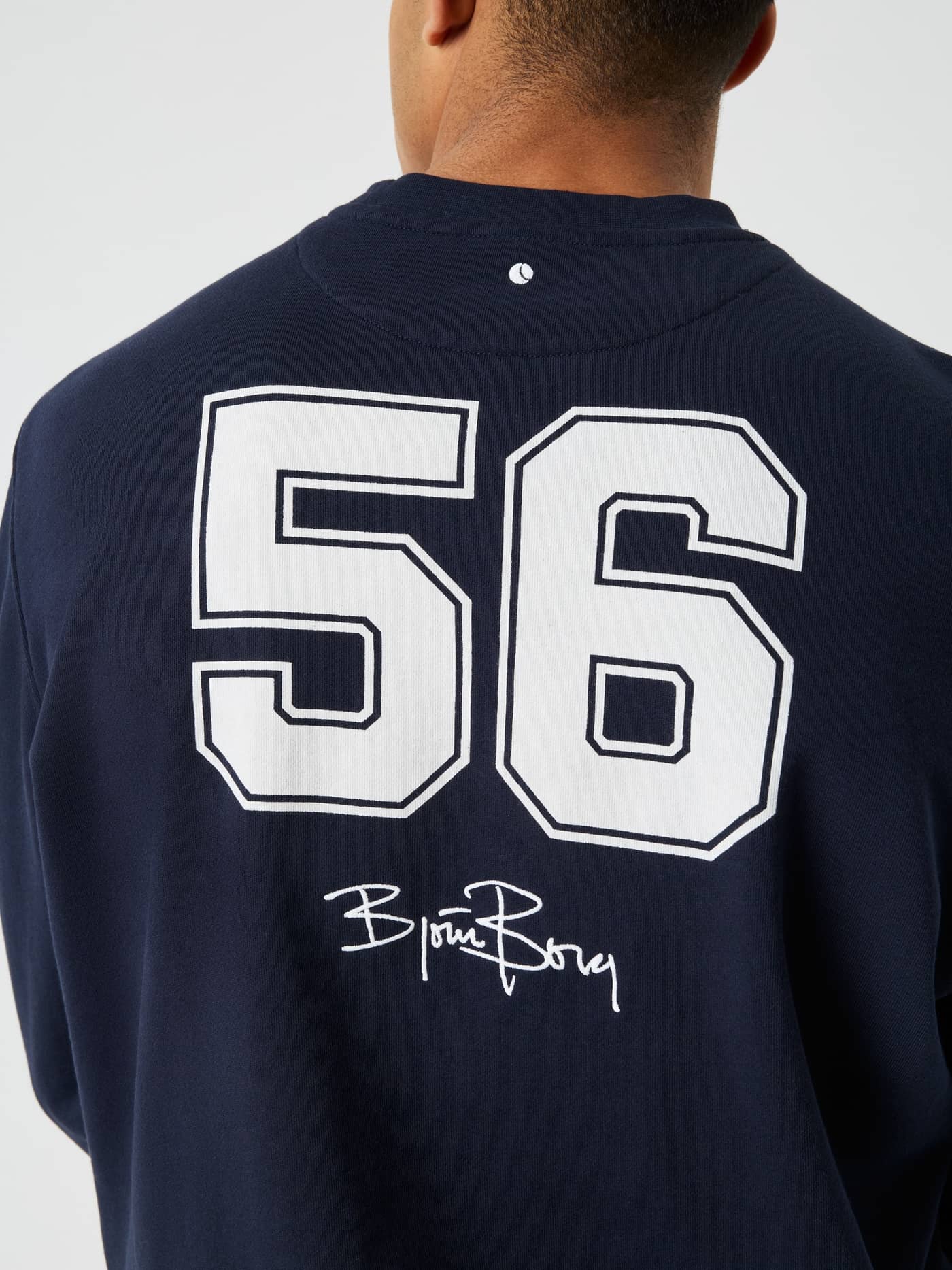 Back view of the cotton Borg Classic Print Sweatshirt in Night sky (Navy) featuring a tennis ball and 56 graphic. - Image 4