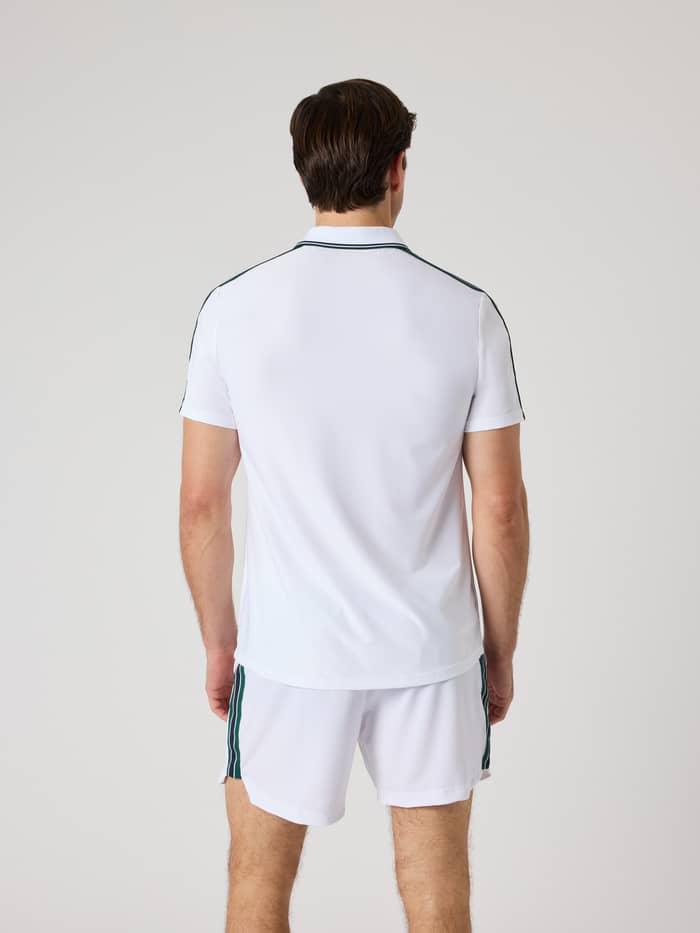 Back view of a man wearing the Björn Borg Ace Retro Polo Shirt in Brilliant White (White), designed for tennis performance. - Image 2