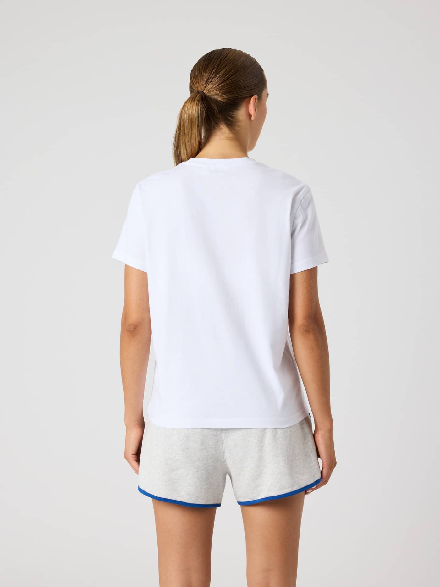 Back view of the Borg Cotton T-Shirt in Brilliant White (White), a stylish cotton top with a regular fit and tennis detail. - Image 4
