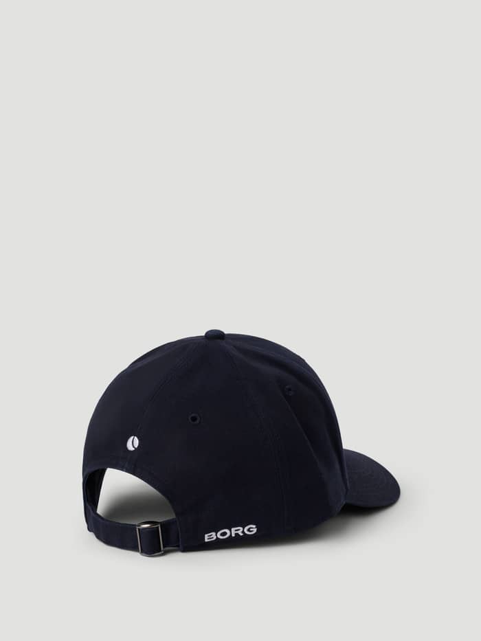 Back view of the organic cotton Borg Signature Cap in Night sky (Navy) featuring a small tennis ball print. - Image 2