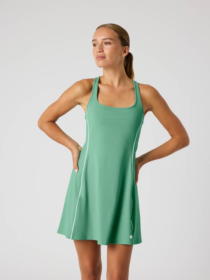 Front view of the Malachite Green (Green) Björn Borg Ace Scooped Racerback Dress, a slim fit tennis style with a white logo.