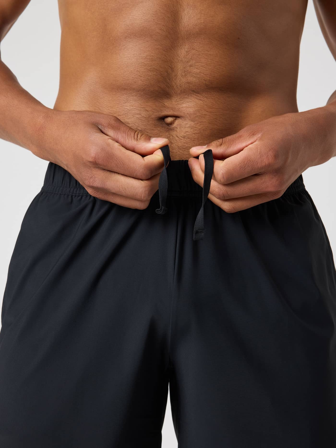 Detailed close-up of the drawstring on the functional Borg Golf Sports Shorts 8 Inch in Black Beauty (Black). - Image 5
