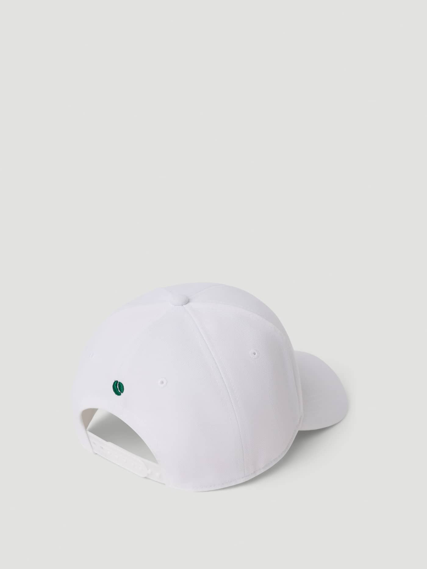 Back view of the Borg Course Cap in Brilliant White (White) for golf, featuring a snapback and tennis ball detail. - Image 4
