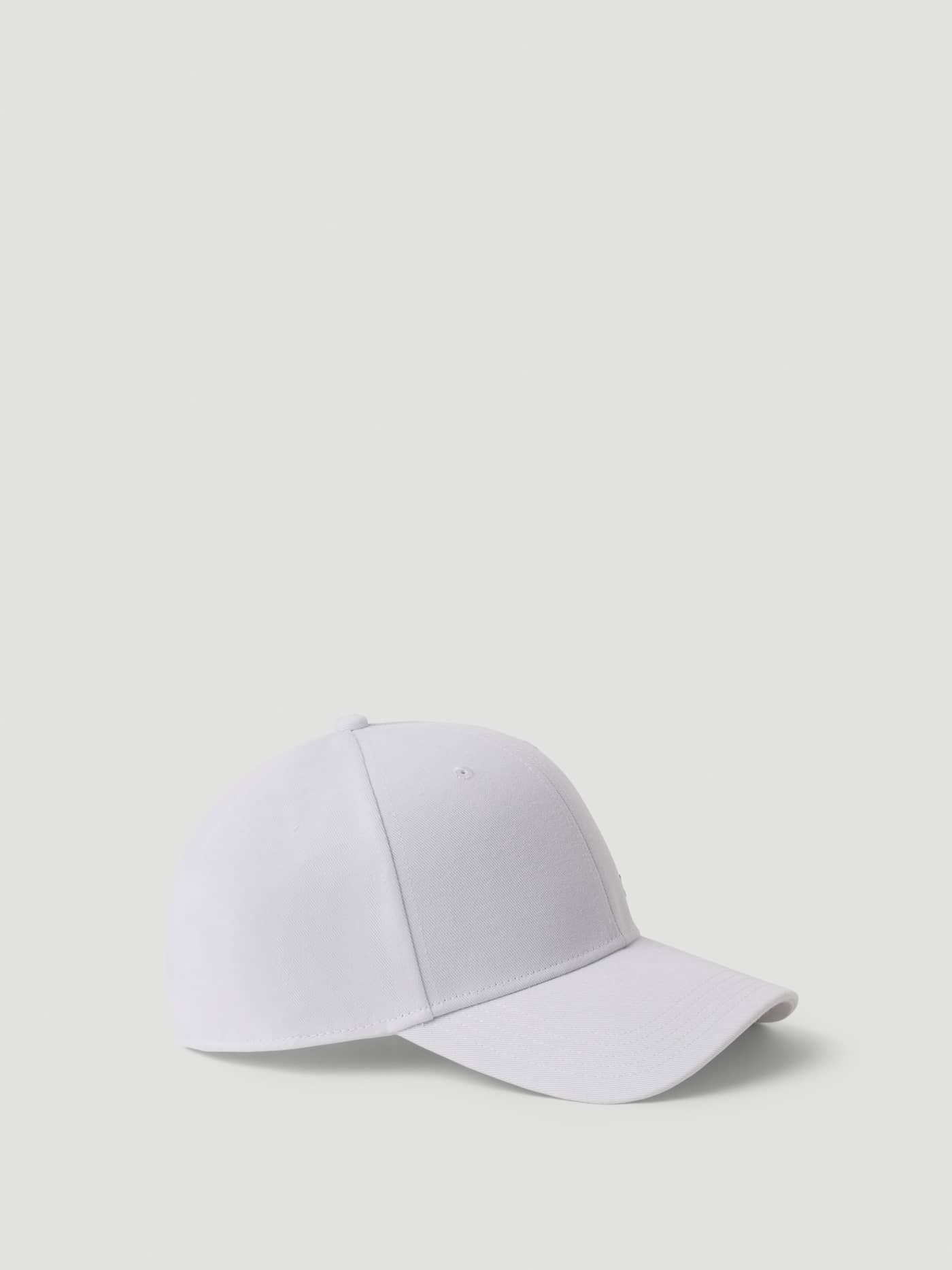 Side view of the Borg Course Cap in Brilliant White (White), a performance-focused accessory for the golf course. - Image 3