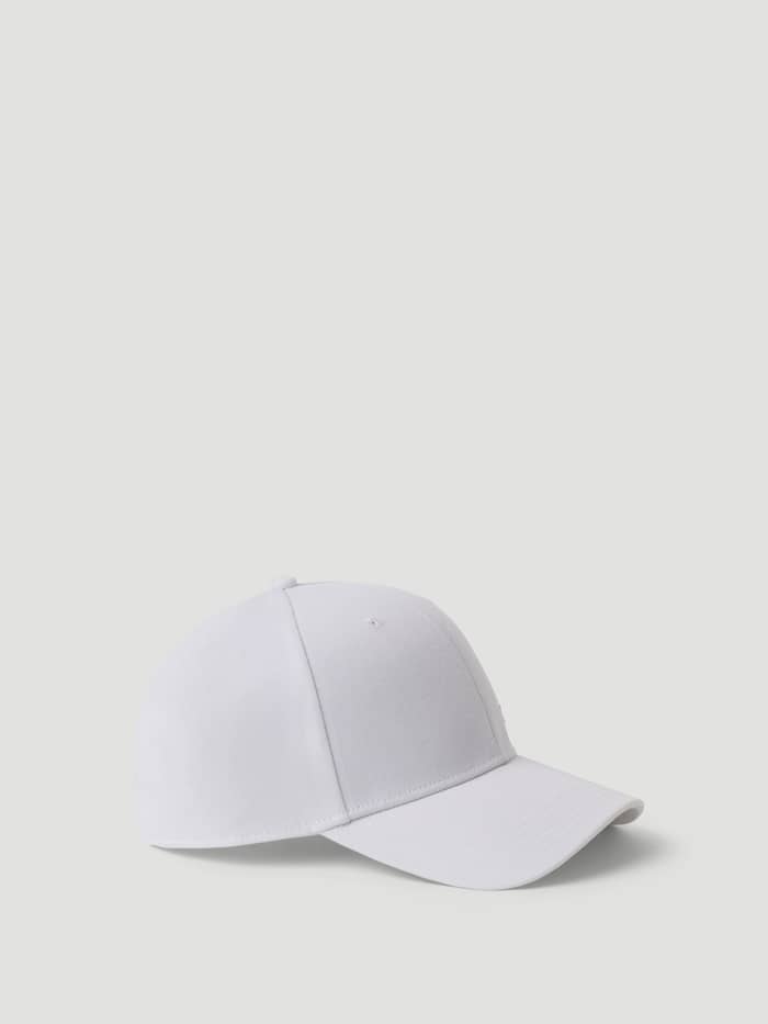 Side view of the Borg Course Cap in Brilliant White (White), a performance-focused accessory for the golf course. - Image 3
