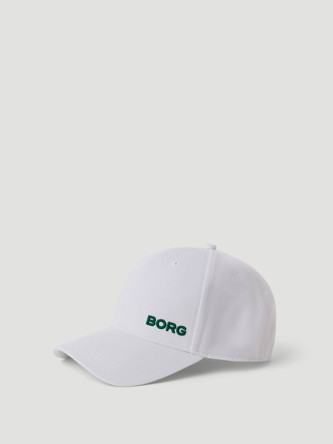 Side view of the Björn Borg Borg Course Cap in Brilliant White (White) for golf, made from recycled polyester. - Image 2