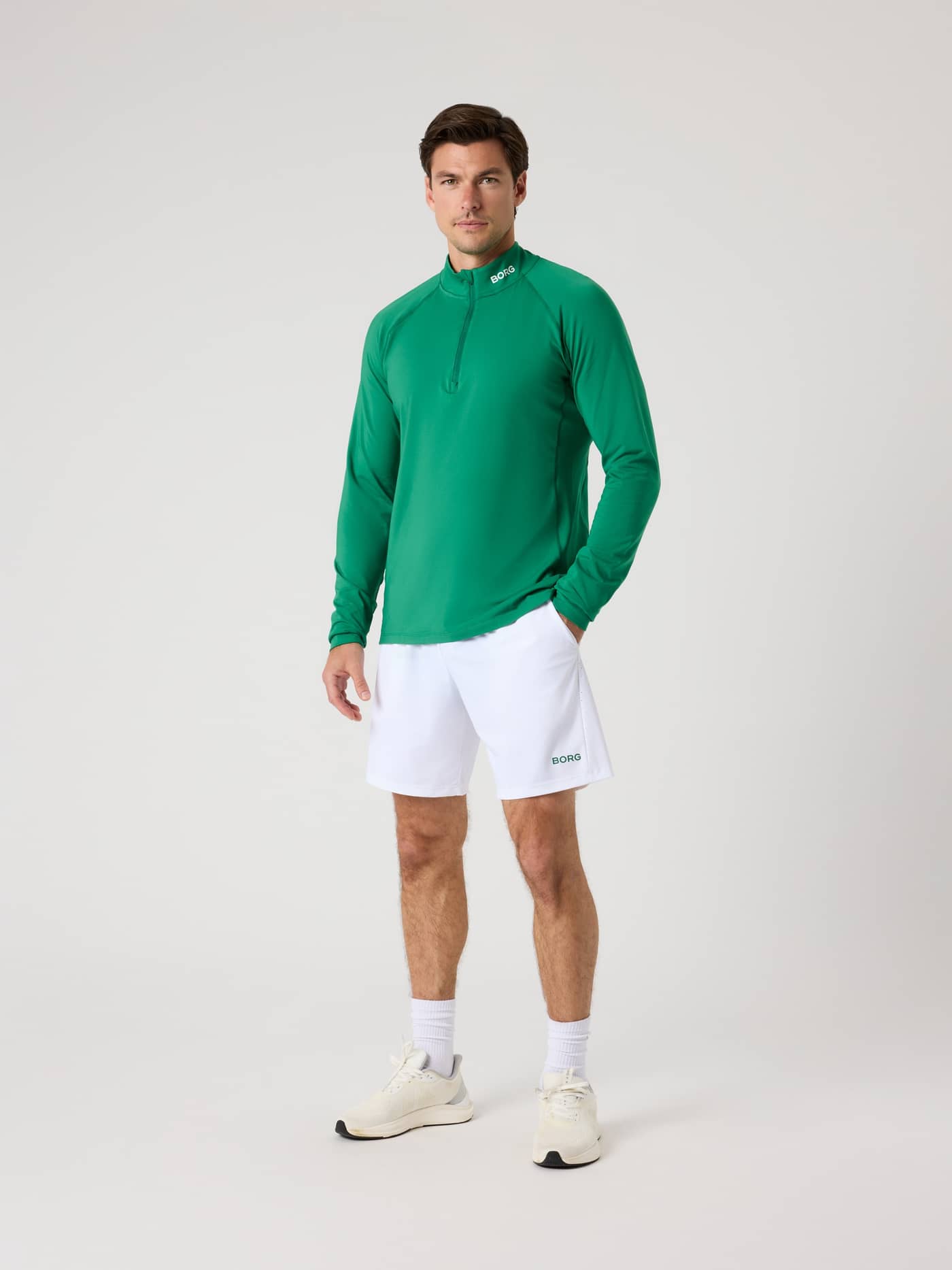Full-body front view of a man wearing the Borg Golf Midlayer Half Zip in Verdant Green (Green) for golf performance. - Image 3