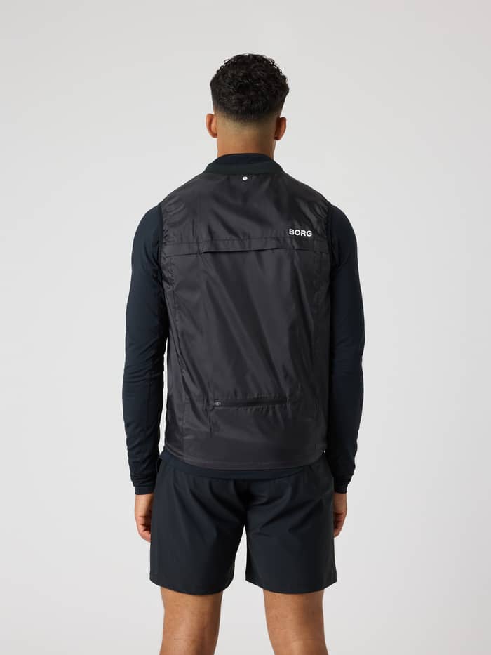 Back view of the Borg Golf Vest Ripstop in Black Beauty (Black) featuring a white logo and functional back vent for golf. - Image 3