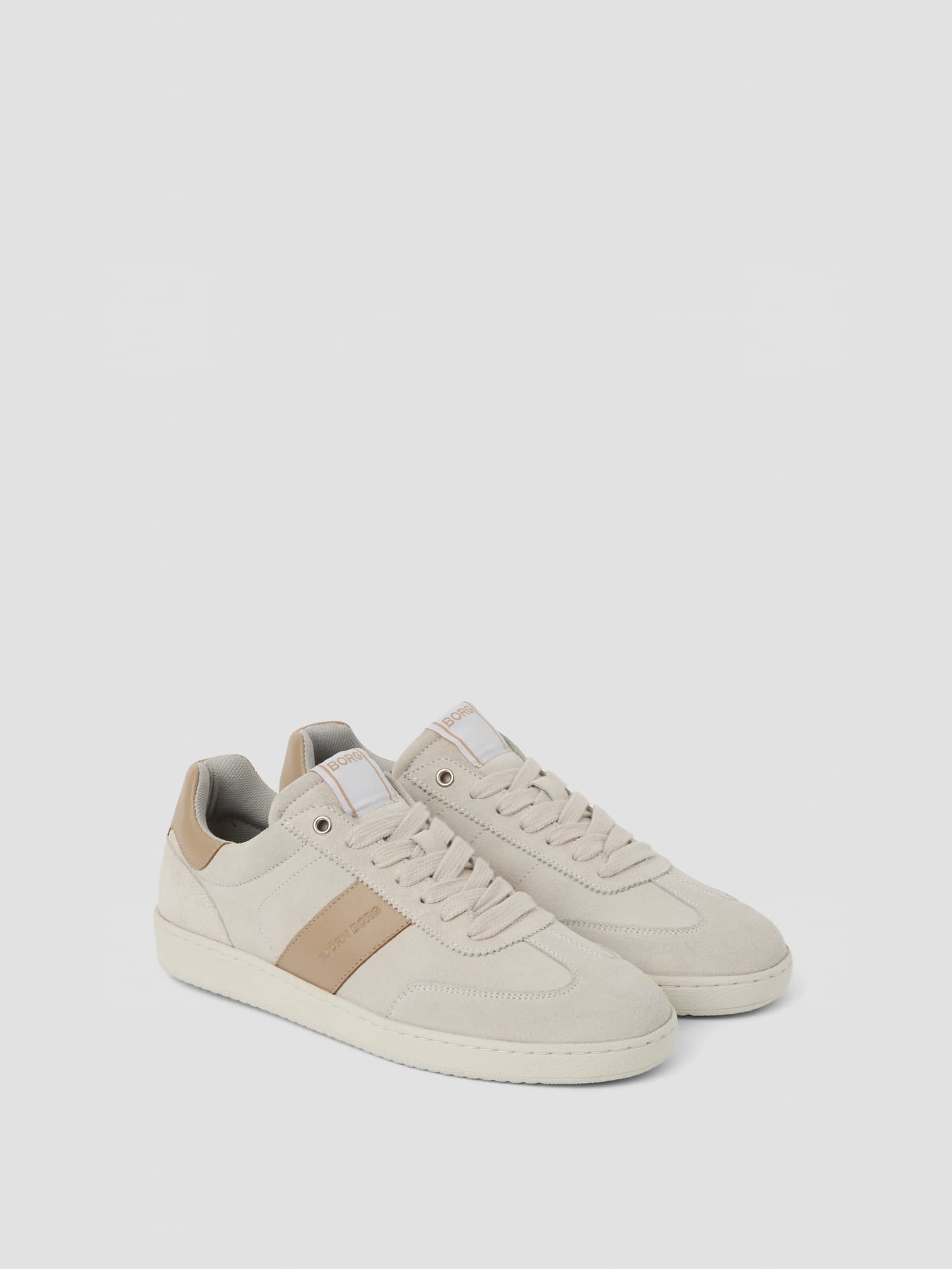 Women's Grace Leather Sneakers i vit och beige premiumläder med en stilren, tennisinspirerad passform. - Image 1