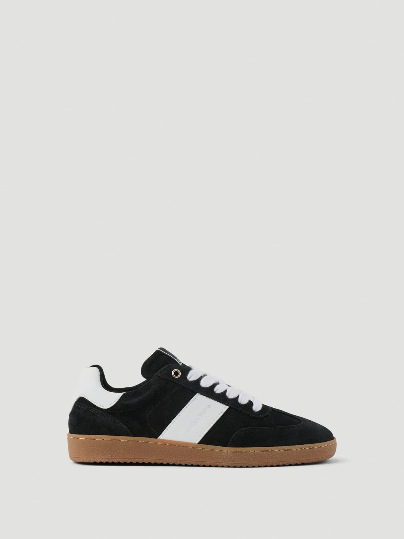 Women's Grace Leather Sneakers in black and white leather featuring a gum sole and tennis-inspired design. - Image 1