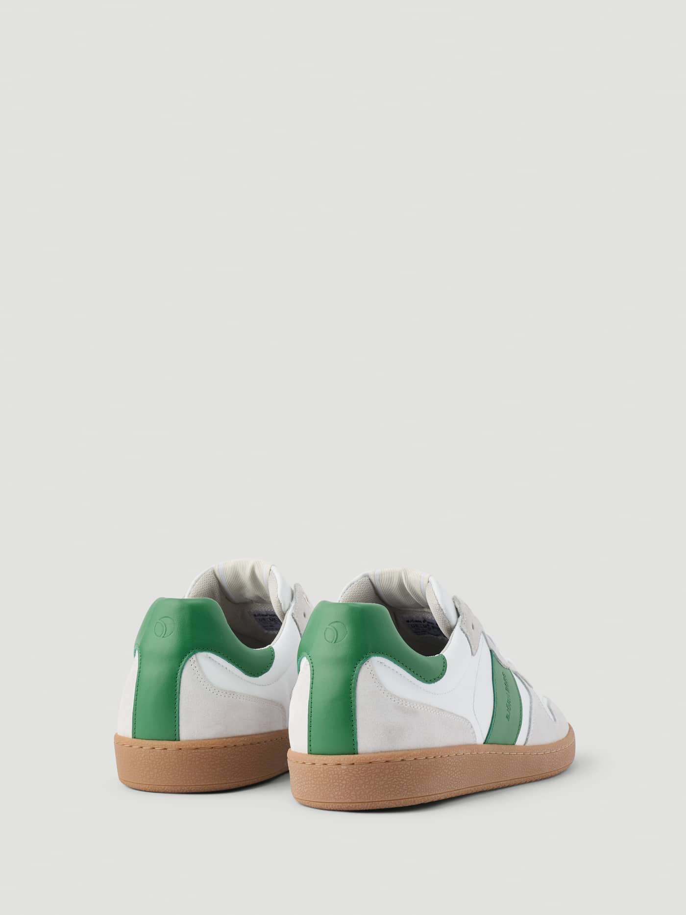 Men's Legacy Leather Sneakers in White and Green showing the back view of the tennis-inspired leather design and gum soles. - Image 3