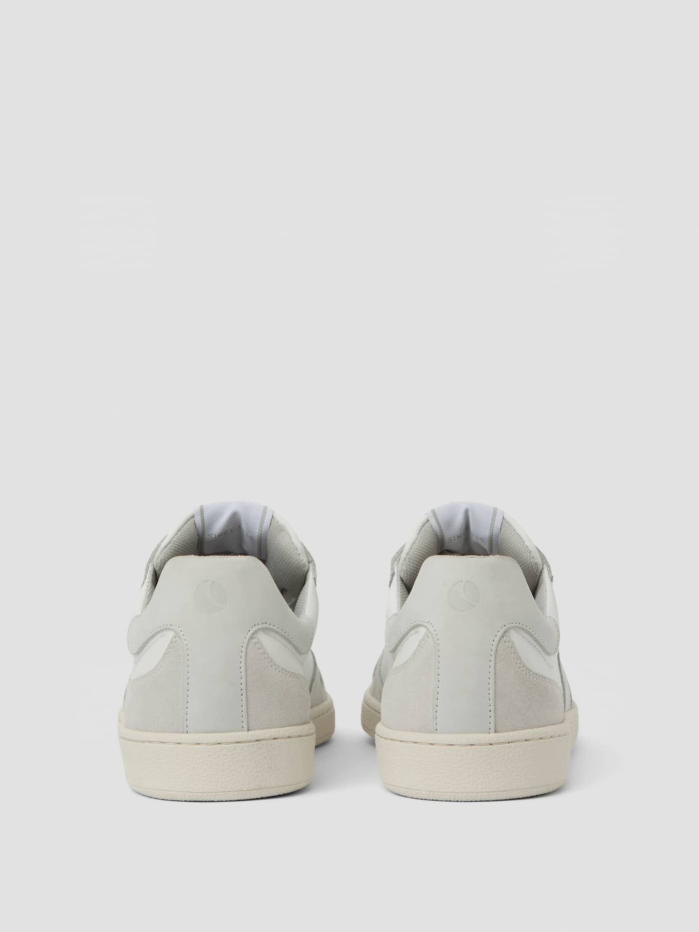 Back view of the white Men's Legacy Leather Sneakers, featuring tennis-inspired style and premium leather quality. - Image 3