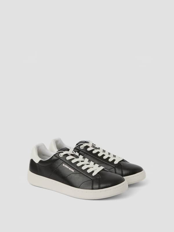 Baskets Unisex Deuce Sneakers noires en cuir synthétique avec logo blanc, alliant style tennis et performance.
