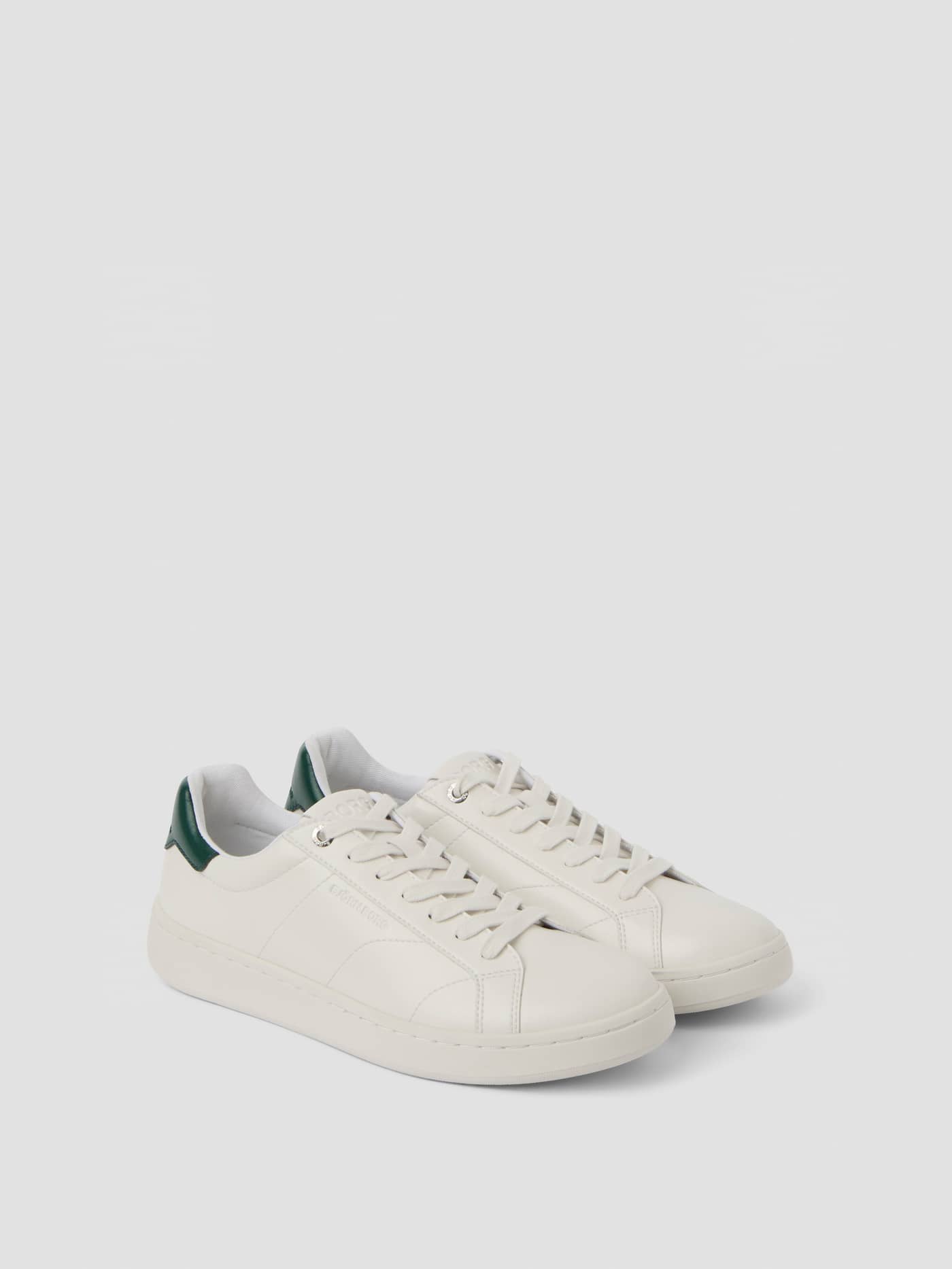 Unisex Deuce Sneakers in white synthetic leather with a waterbased PU finish and a classic tennis-inspired design. - Image 1